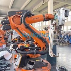 Industrieroboter-Arm KUKA KR210 R3300 EXTRAzweite Handfür den Materialtransport